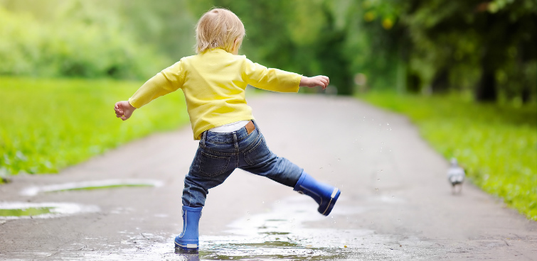 Boy in puddles