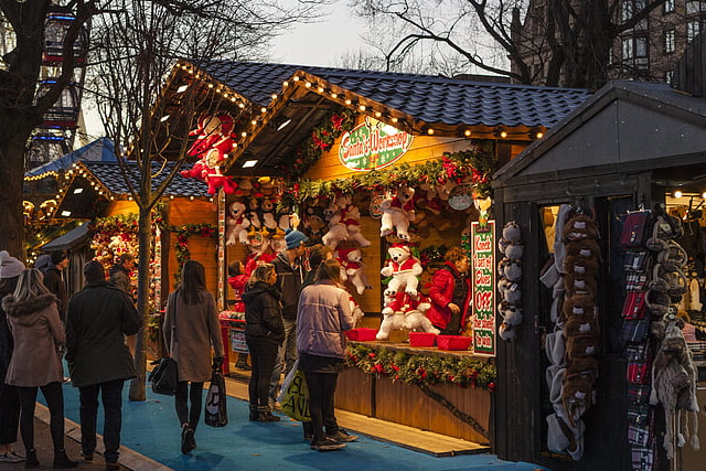 Christmas market stall decorated in twinkly lights