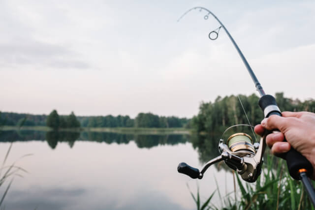 A fisherman fishing for Pike