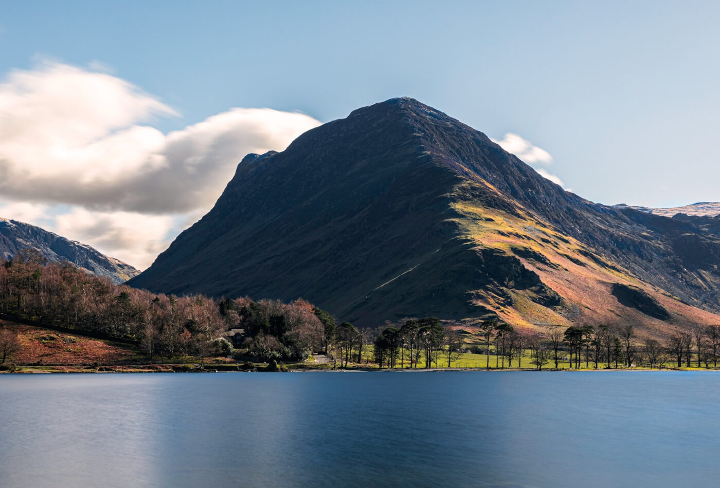 A view across Buttermere to the mountains in the distance