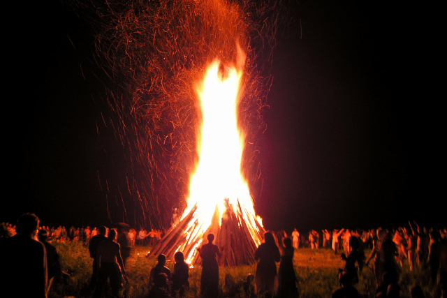 People around a bonfire