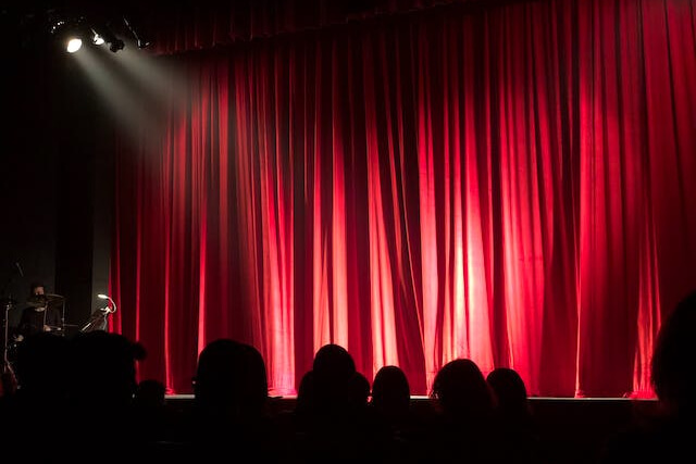 Red curtains on a theatre stage